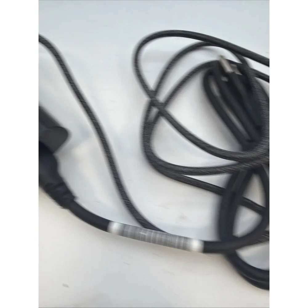 genuine HP 65W USB-C AC adapter.